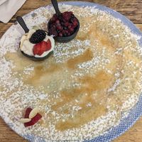 Pancake with berry compote and vegan yoghurt at Double Dutch Pancake House in York