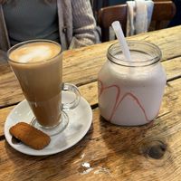 Latte with Oat Milk (left) and Strawberry Milkshake (right) at Double Dutch Pancake House in York