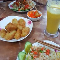 Fried rice, sweet potato cakes and passionfruit juice. at An Lac in Ninh Binh