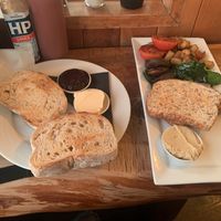 Toast and spreads on the left/  vegan breakfast   at Sandfly Cafe in Te Anau
