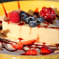 Vegan cheese cake. It was more like a thick jelly than cake and didn´t have any crust or dough. 6 euros is a bit much from this. We got a coupon for free cake because our bill was more than 25 euros.  at Organic Cafe in Fuengirola