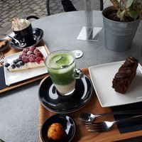 Right side: vegan banana bread, Iced Matcha Latte with soy milk at Kaffabar in Brussels