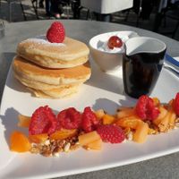 Pancakes with fruit syrup and coconut yogurt at Kaffabar in Brussels