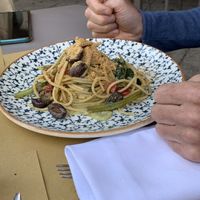 Spaghetti with cream of zucchini, black olives, tomatoes, local greens and bread crumbs   at Tipico in Ragusa
