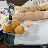 Rolled lamacun at Cigköftem in Lyon