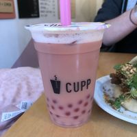 Rose milk tea with strawberry bubbles (oat milk)  at CUPP Bubble Tea in Bristol