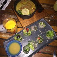 Coco and rice soup and salad rolls at La Playita in Bacalar