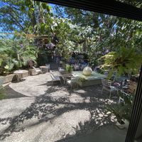 Outdoor seating area at Luv Burger in Nosara