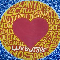 Sign outside at Luv Burger in Nosara