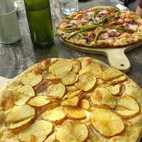 Pizza Lucile (front) and Pizza Mexicano (back) at Luv Burger in Nosara