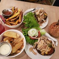 Coco bacon burger, tropical burger, yucca fries, sweet potatoes (ALL SO AMAZING!!!) 
 at Luv Burger in Nosara
