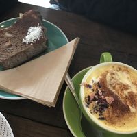 Turmeric latte and toasted banana bread   at Komuniti in Long Jetty