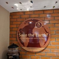 yeah. Save the earth!!! at Zuka Cake and Dessert Shop in Pondicherry