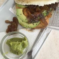 Venezuelan corn arepa with hummus, avocado, and vegan sausage at Aqui y Ahora  in Lanzarote