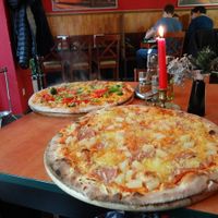 Vegan Hawaiian pizza in the front, broccoli pizza without cheese in the back.  at Roma Ristorante Pizzeria in Leipzig