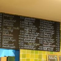 Menu with many vegan/vegetarian burgers.  at Frituur De Papegaai in Ghent