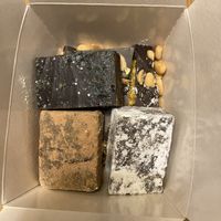 Caramel-sea salt chocolate, Bailey’s chocolate, peppermint chocolate. Underneath is snickers    at Karu Talu Šokolaad  in Tallinn