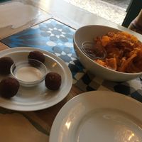 Vegan sausage croquettes and sweet potato chips at Graça 77 in Lisbon