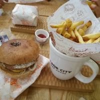 amazing tomato cheese burger and fries at Moomoo Burger & Smoothie in Busan