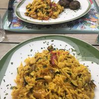 Cous cous and veggie burgers; paella  at Il Giardino delle Rane in Garda