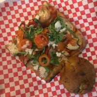 Vegan pizza & vegan arancini  at La Mezcla in Barcelona