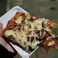 Vegan pizza slice at La Mezcla in Barcelona