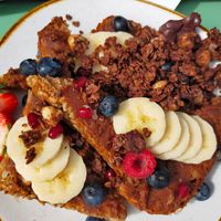 SpeltdesemtoastMet huisbereide hazelnootpasta en banaan at Madam Bakster in Ghent