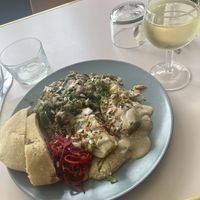 Special of the day hummus and bread with artichoke and other veggies   at Le Myrha in Paris