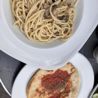 Mushroom carbonara with garlic bread. They also had vegan Parmesan !  at Casa Romana Italian Restaurant in Carlisle