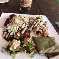 Plata a la mexicana - tamale, sopes, enchiladas  at Taqueria Entre Zankas in Zihuatanejo