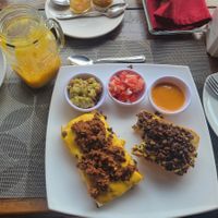 The remains of a mango smoothie and a good meal. at Taqueria Entre Zankas in Zihuatanejo