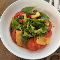 Caprese type salad. It used to be on the menu but I wasn’t when I visited. They were able to make it w/ a different almond cheese and it was good!  at Taqueria Entre Zankas in Zihuatanejo