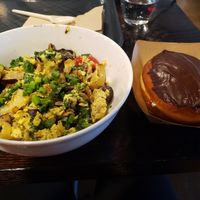 Scramble (made with vegan Just Egg) and creme filled doughnut. at Stem Farm and Kitchen in Baltimore