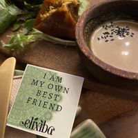 Raw dumplings and we each got a cute card on our plate  at Elixiba in Byron Bay