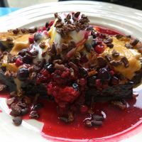 French toast w/ raspberry compote, coconut cream, peanut butter, and cocoa nibs at Lele's in East London