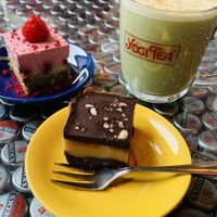 Chocolate peanut square, cheesecake and a matcha chai latte at Dandelion Cafe in Saltaire
