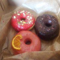 raspberry pistachio, blood orange and chocolate cocoa nibs at Good Town Doughnuts in Costa Mesa