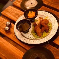 Frituras de malanga con mayonesa Vegana de zanahoria y otra con miel at El Shamuskia'o in Havana