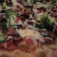 Pizza closeup   at Baba Louie's Sourdough Pizza in Great Barrington