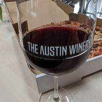 Li'l Nonna's patrons can dine inside the wine bar adjacent to the trailer.  The "Spaghetti Western" is a fine pairing with the pies. at Li'l Nonna's in Austin