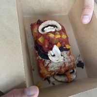 Sicilian slice. It was just okay. Mostly dough which was good but they were stingy with the cheese tbh  at Li'l Nonna's in Austin