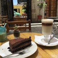 vegan cake and cappuccino at Omphalos in Arequipa
