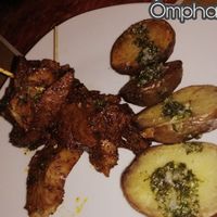 Anticuchos, traditional Peruvmadr vegan using seitán. at Omphalos in Arequipa
