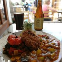 Rocoto relleno, pastel de papa, guiso y torrejita. at Omphalos in Arequipa