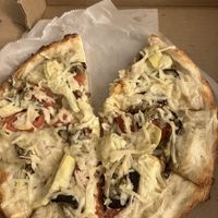 Vegan personal pan pizza was delicious! Eggplant, tomato, artichoke, & veg cheese. Very garlicky which I like.  at Mister Pizza in Buffalo