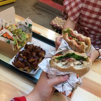 Two burgers, chips with super nice sauce and nachos. at La Trocadero in Barcelona