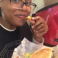 Happily stuffing my face with patatas especiadas! at La Trocadero in Barcelona