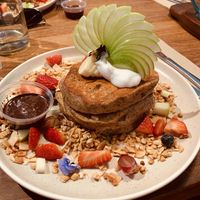 The pancake stack ... some serious yum on that plate! 🌱 at Ruby Lane Wholefoods in Manly
