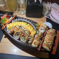 Sushi boat with crispy vegano, Fuji, tofu veggie, and vegano rolls    at Kappa Sushi in La Fortuna