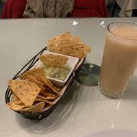 Nachos with pear juice at Organi Chiado in Lisbon
